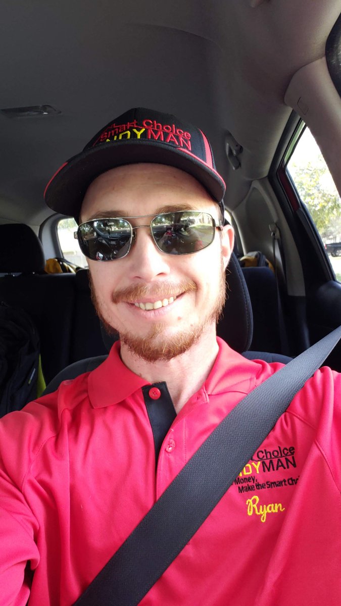 Ryan Chall, founder of BlueCaller AI, in the work truck